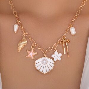 PEACHY BEACH seashell and starfish necklace on gold plated chain NWT Beachy vibe
